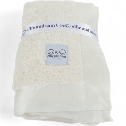 Luxury chenille baby blanket with satin trim ivory folded soft fabric made in USA