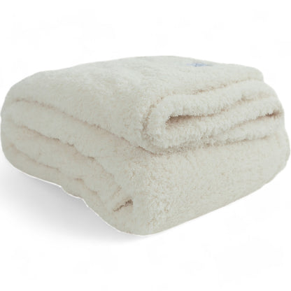 Ivory chenille throw blanket styled on chair plush soft home decor made in USA