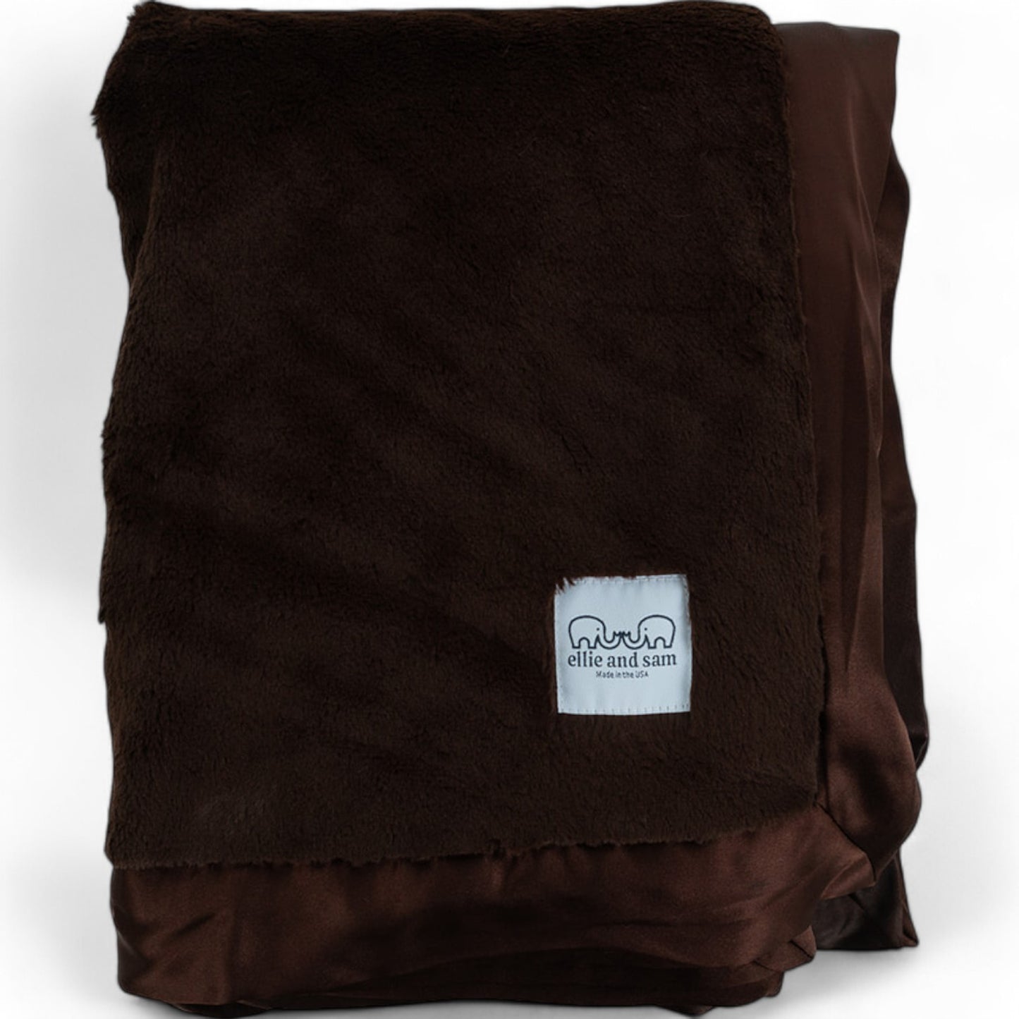Chocolate luxury throw blanket with satin trim, soft fluffy texture and smooth finish
