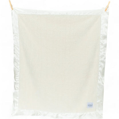 Chenille baby blanket ivory with satin trim plush texture close up made in USA